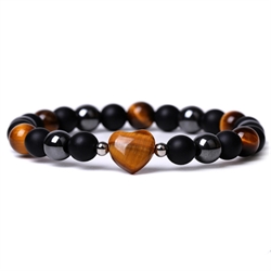 Armbånd af hæmatit, tiger øje og abrazin sten. Elastisk. 19 cm