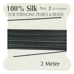 Silke tråd. 0.7 mm. Inkl. nål. Sort