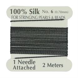 Silke tråd. 0.7 mm. Inkl. nål. Sort